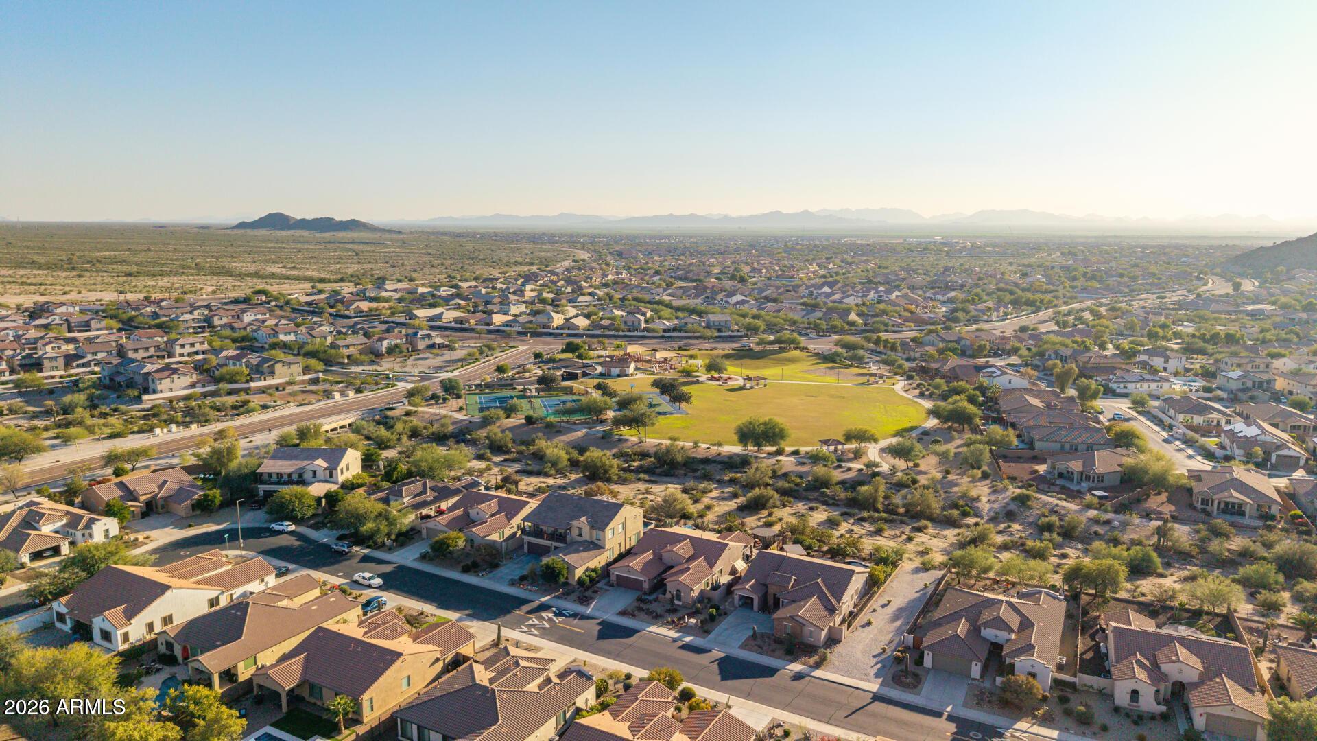 17869 West Verdin Road Goodyear, AZ 85338 - Photo 35 of 39 an aerial view of residential building and lake