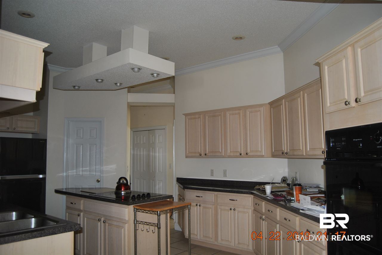 411 Juniper Creek Road Brewton, AL 36426 - Photo 23 of 35 opposite side of kitchen features pantry