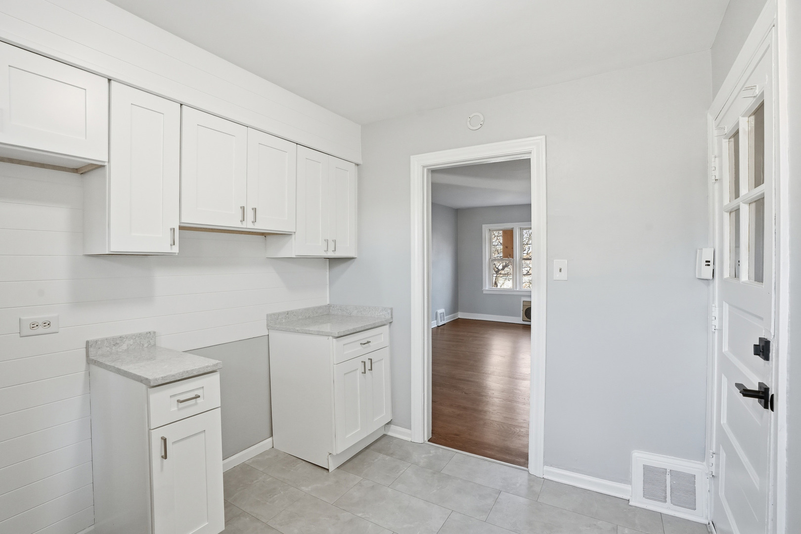 6550 North Ridge Boulevard, Unit 2 Chicago, IL 60626 - Photo 14 of 32 a view of cabinets and utility room with closet