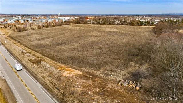 a view of an ocean beach and a mountain