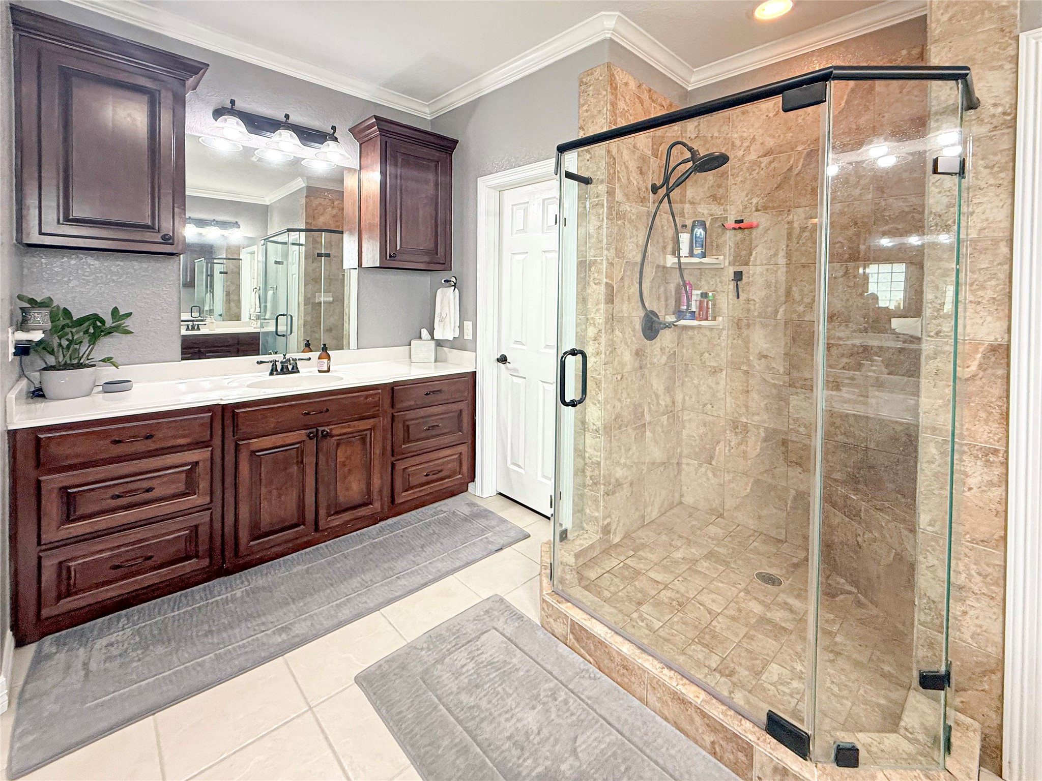 807 Mill Road Angleton, TX 77515 - Photo 25 of 46 Relax and unwind in the luxurious primary bath with soaking tub and spacious walk-in shower.