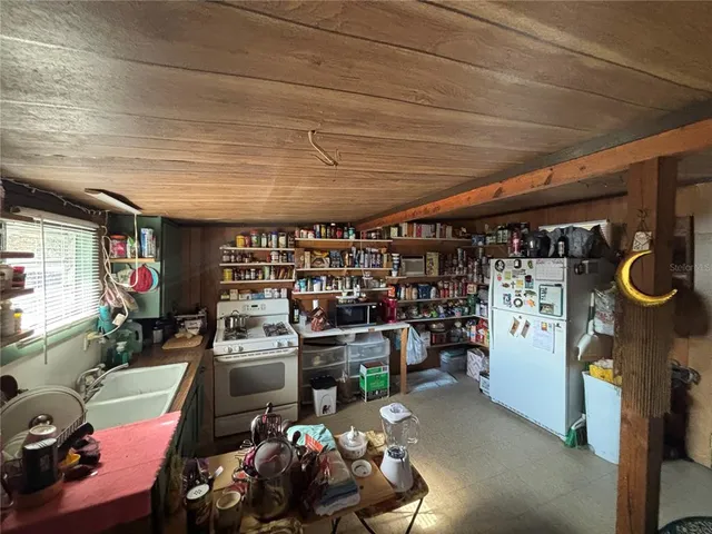 a bedroom with a bed and a walk in closet