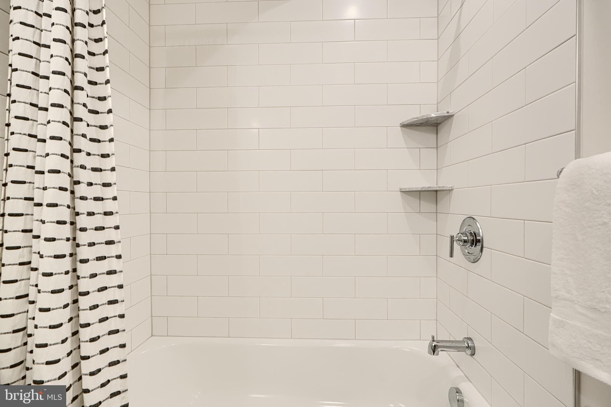 814 Grundy Street Baltimore, MD 21224 - Photo 18 of 31 a bathroom with a shower