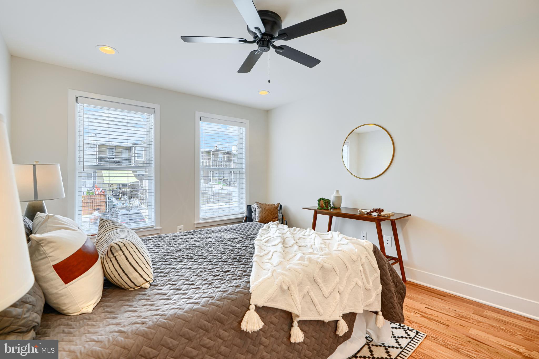814 Grundy Street Baltimore, MD 21224 - Photo 24 of 31 a bedroom with furniture and a large window