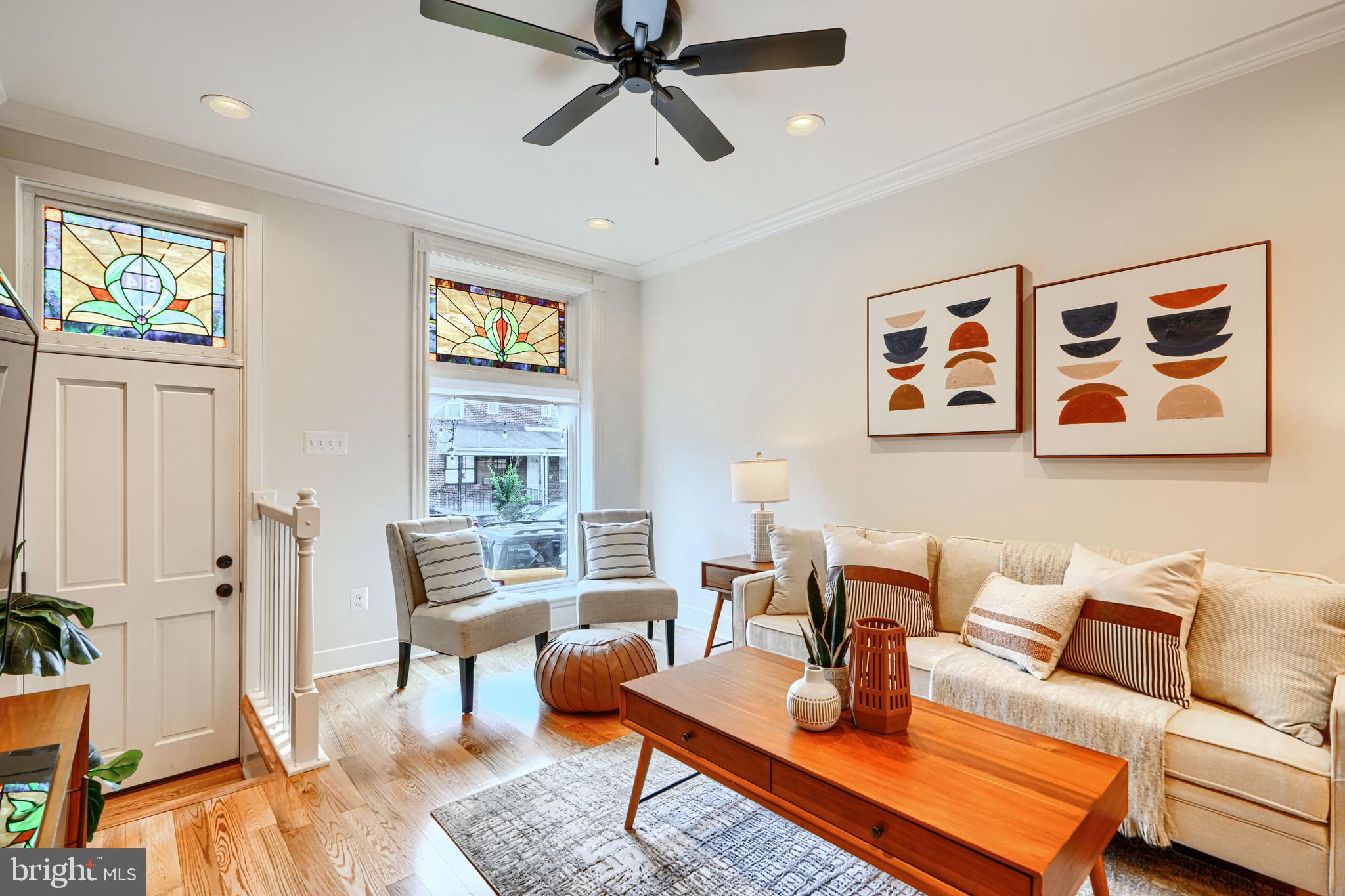 814 Grundy Street Baltimore, MD 21224 - Photo 6 of 31 a living room with furniture and a window