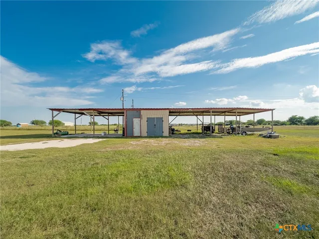a view of a house with a big yard