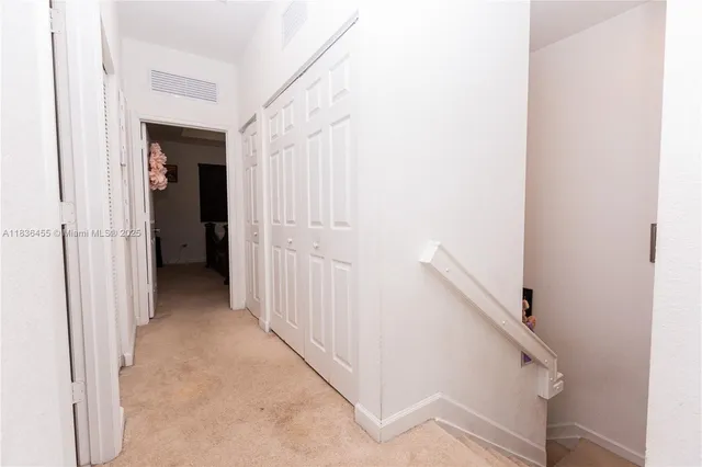 a view of a hallway with hallway