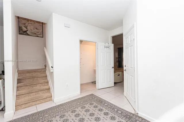 a view of an entryway with staircase