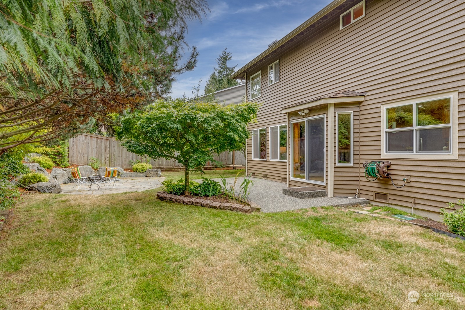 2415 Viewcrest Avenue Everett, WA 98203 - Photo 14 of 37 a view of a house with backyard and sitting area