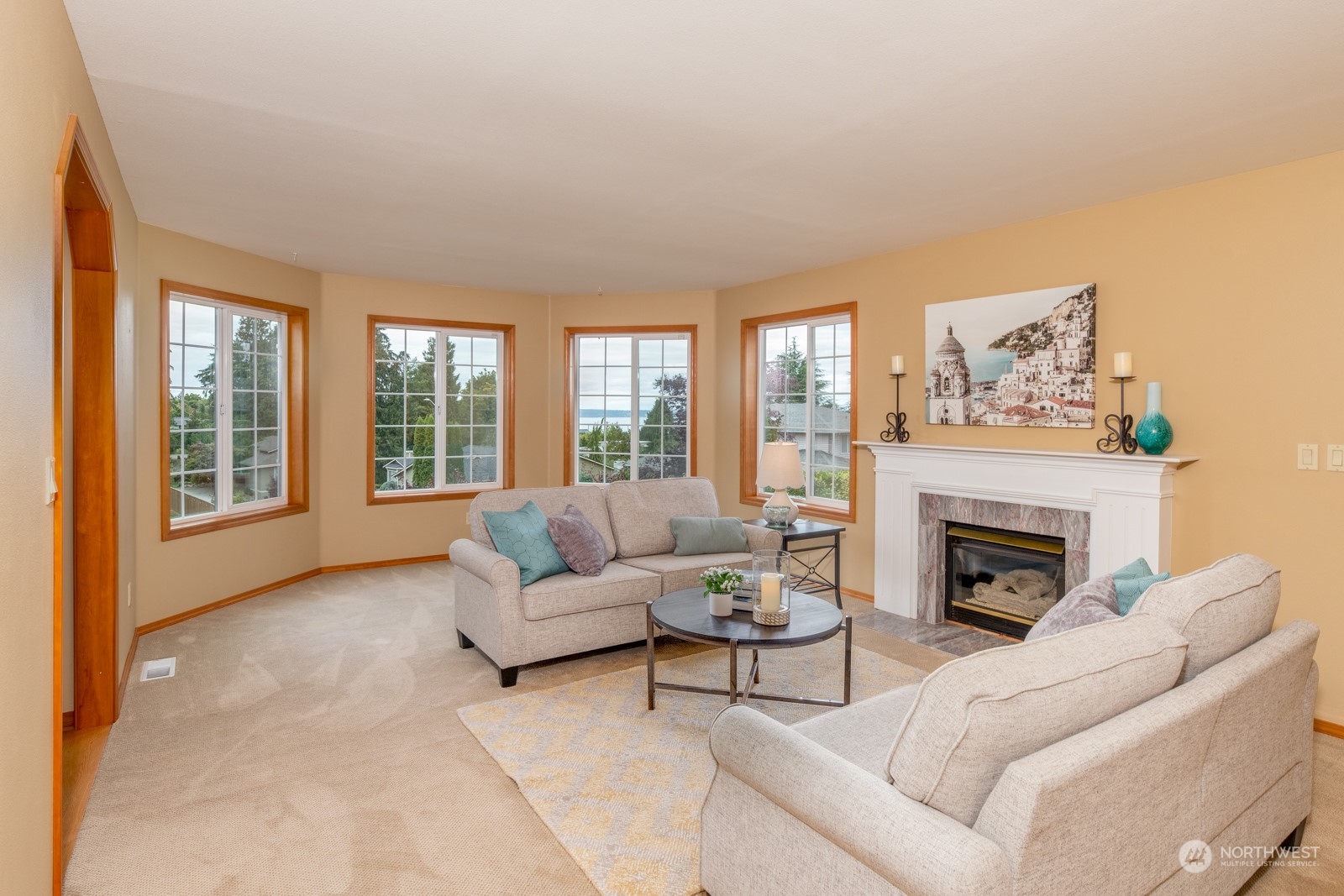 2415 Viewcrest Avenue Everett, WA 98203 - Photo 16 of 37 a living room with furniture and a fireplace