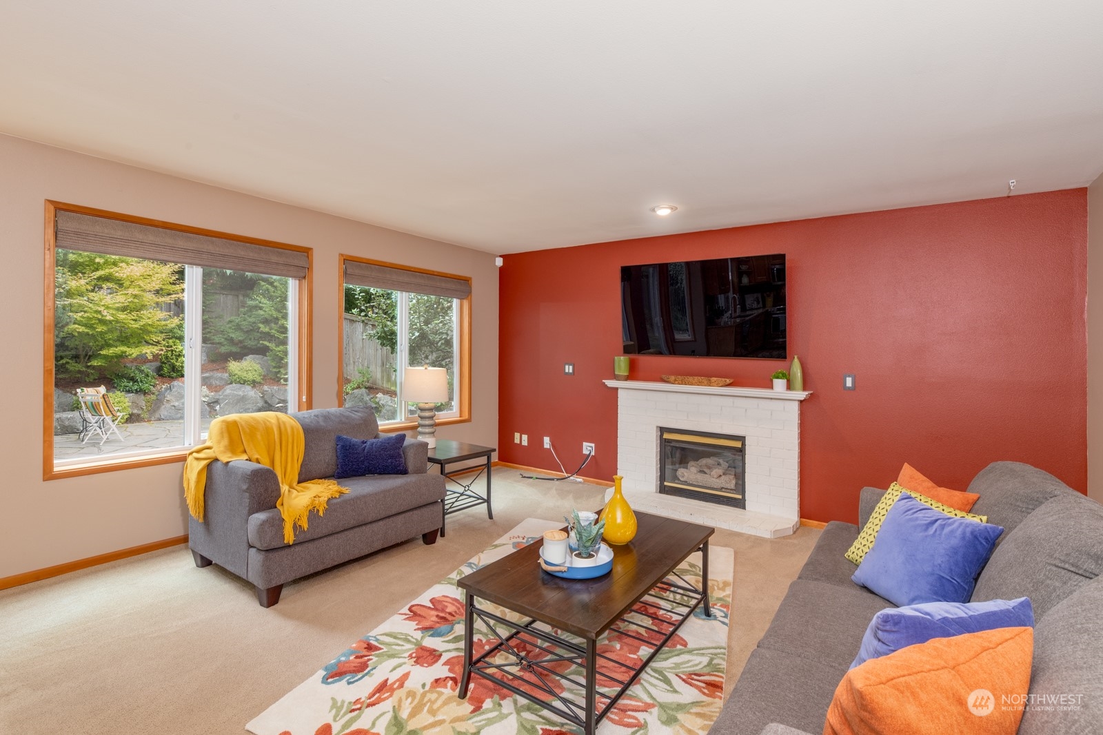 2415 Viewcrest Avenue Everett, WA 98203 - Photo 22 of 37 a living room with furniture and a fireplace