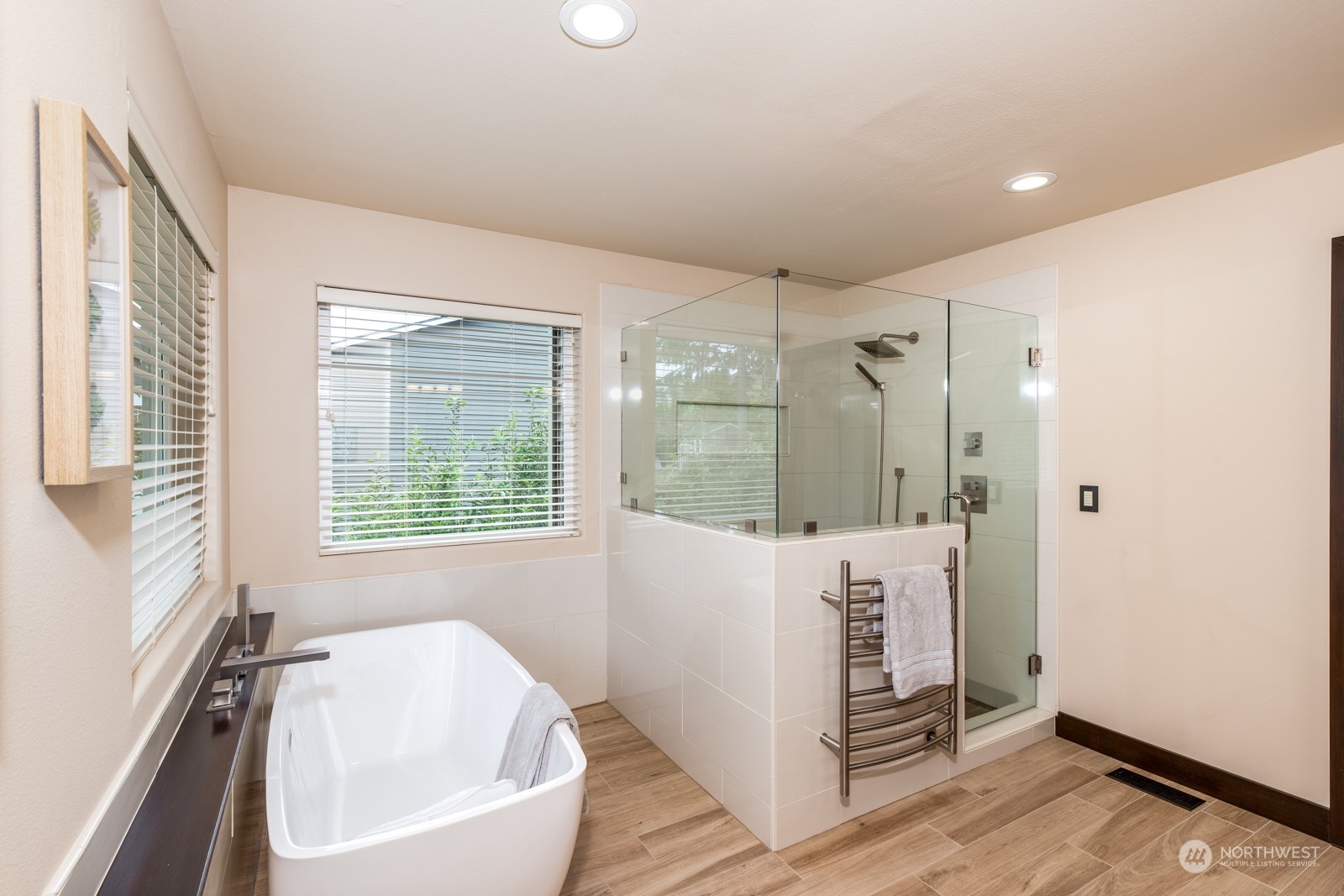 2415 Viewcrest Avenue Everett, WA 98203 - Photo 29 of 37 a bathroom with a bathtub a sink and a shower