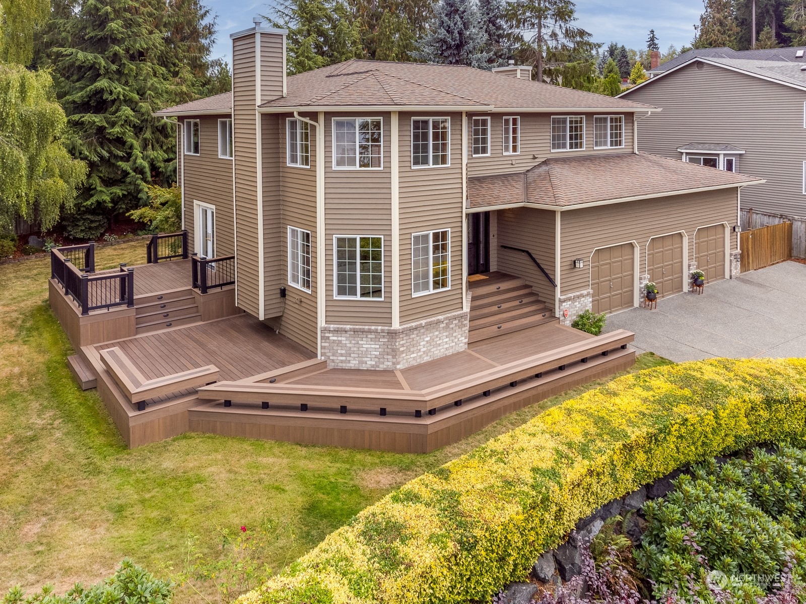 2415 Viewcrest Avenue Everett, WA 98203 - Photo 3 of 37 a front view of a house with a yard table and chairs