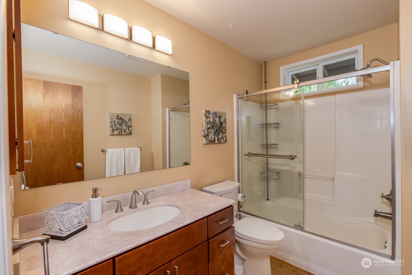 2415 Viewcrest Avenue Everett, WA 98203 - Photo 34 of 37 a bathroom with a granite countertop sink toilet and shower