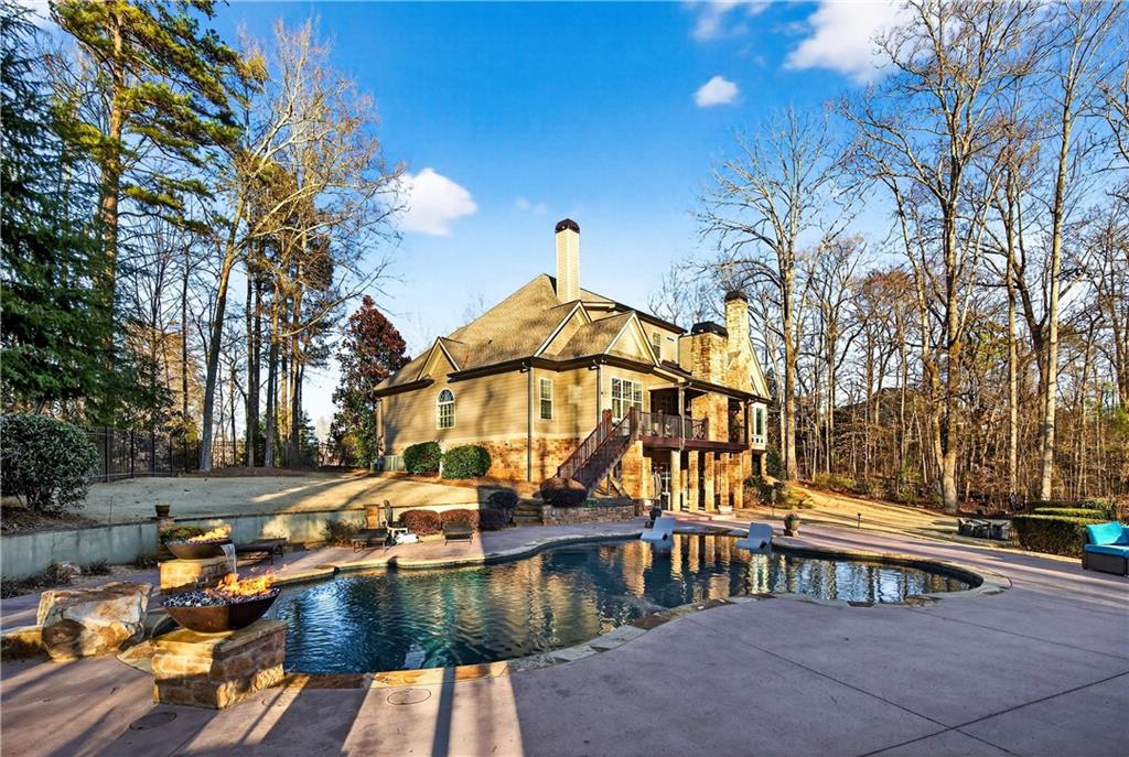 18 Willow Place Newnan, GA 30265 - Photo 105 of 130 a view of a house with pool and sitting area