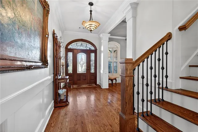 a view of a walk in closet and bathroom