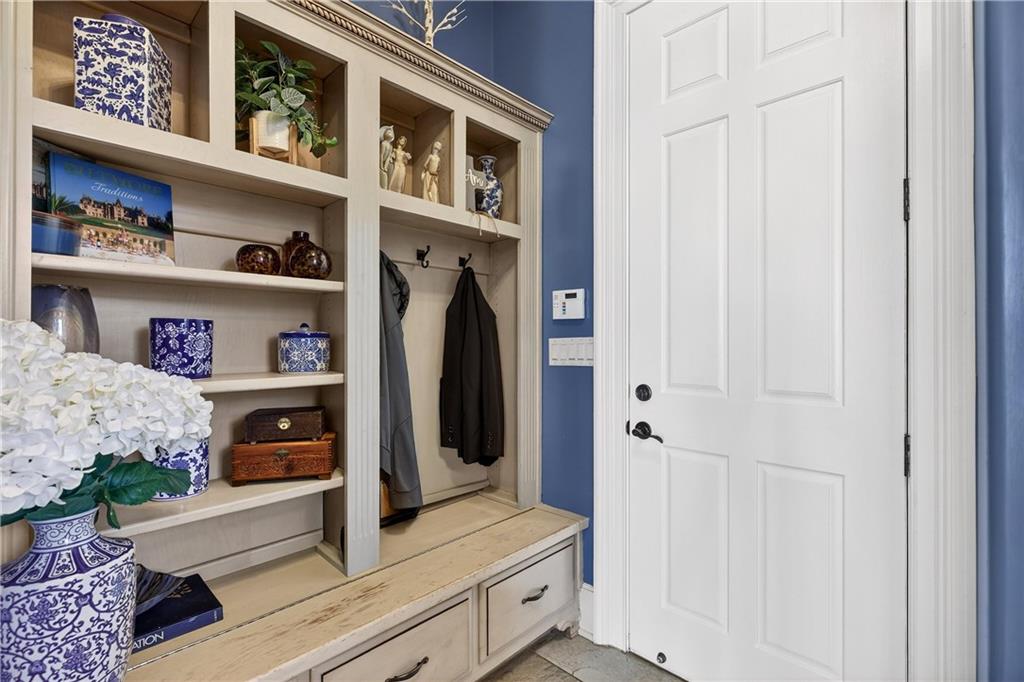 18 Willow Place Newnan, GA 30265 - Photo 46 of 130 a view of walk in closet with clothes and shoes