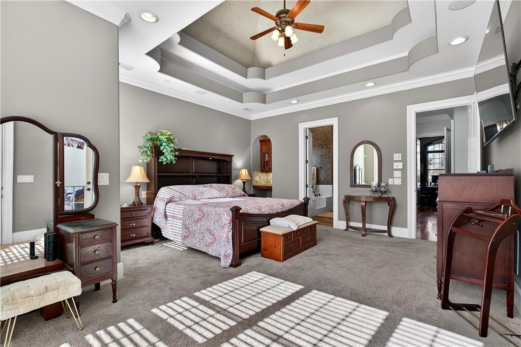 18 Willow Place Newnan, GA 30265 - Photo 53 of 130 a bed room with furniture and wooden floor