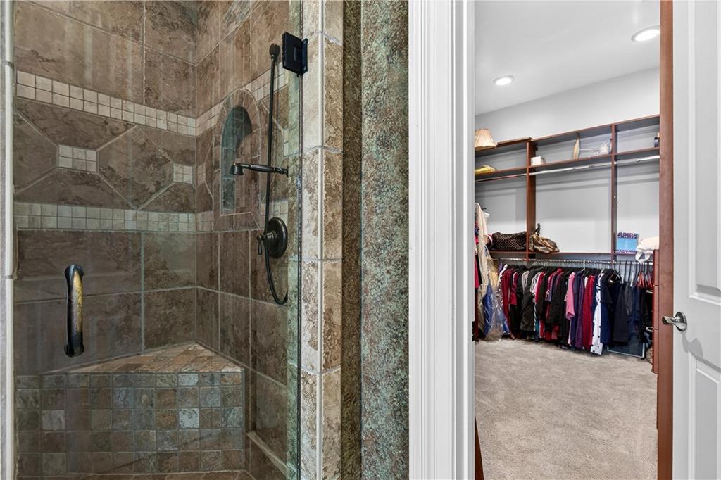 18 Willow Place Newnan, GA 30265 - Photo 60 of 130 a view of a walk in closet and bathroom