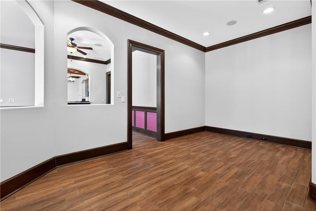 18 Willow Place Newnan, GA 30265 - Photo 92 of 130 a view of an empty room with wooden floor and a window