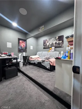 a bathroom with a sink toilet and a mirror