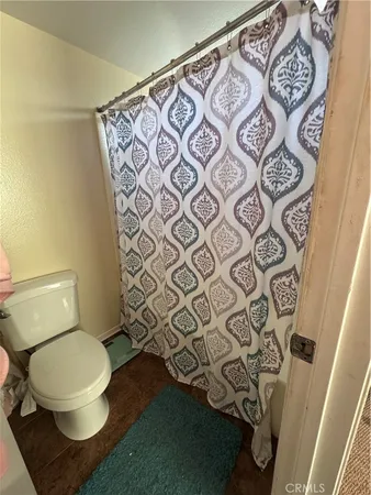 a utility room with furniture and a window