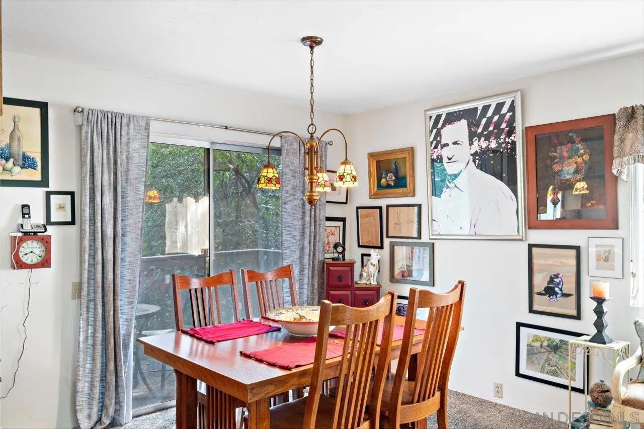 808 Pine Cone Drive Julian, CA 92036 - Photo 14 of 23 a view of a dining room with furniture window and wooden floor