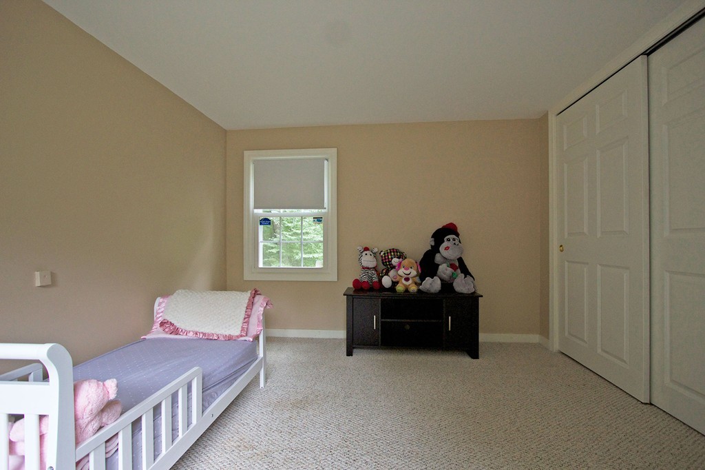 55 Garrison Road Shirley, MA 01464 - Photo 5 of 9 a bedroom with furniture and a window