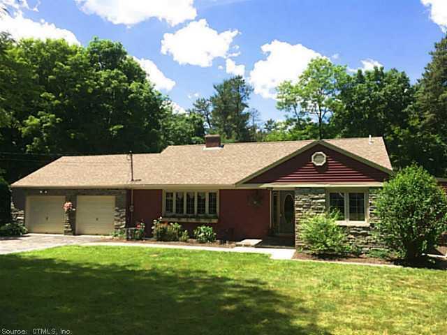 599 Snake Meadow Road Plainfield, CT 06239 - Photo 1 of 1 a front view of a house with garden