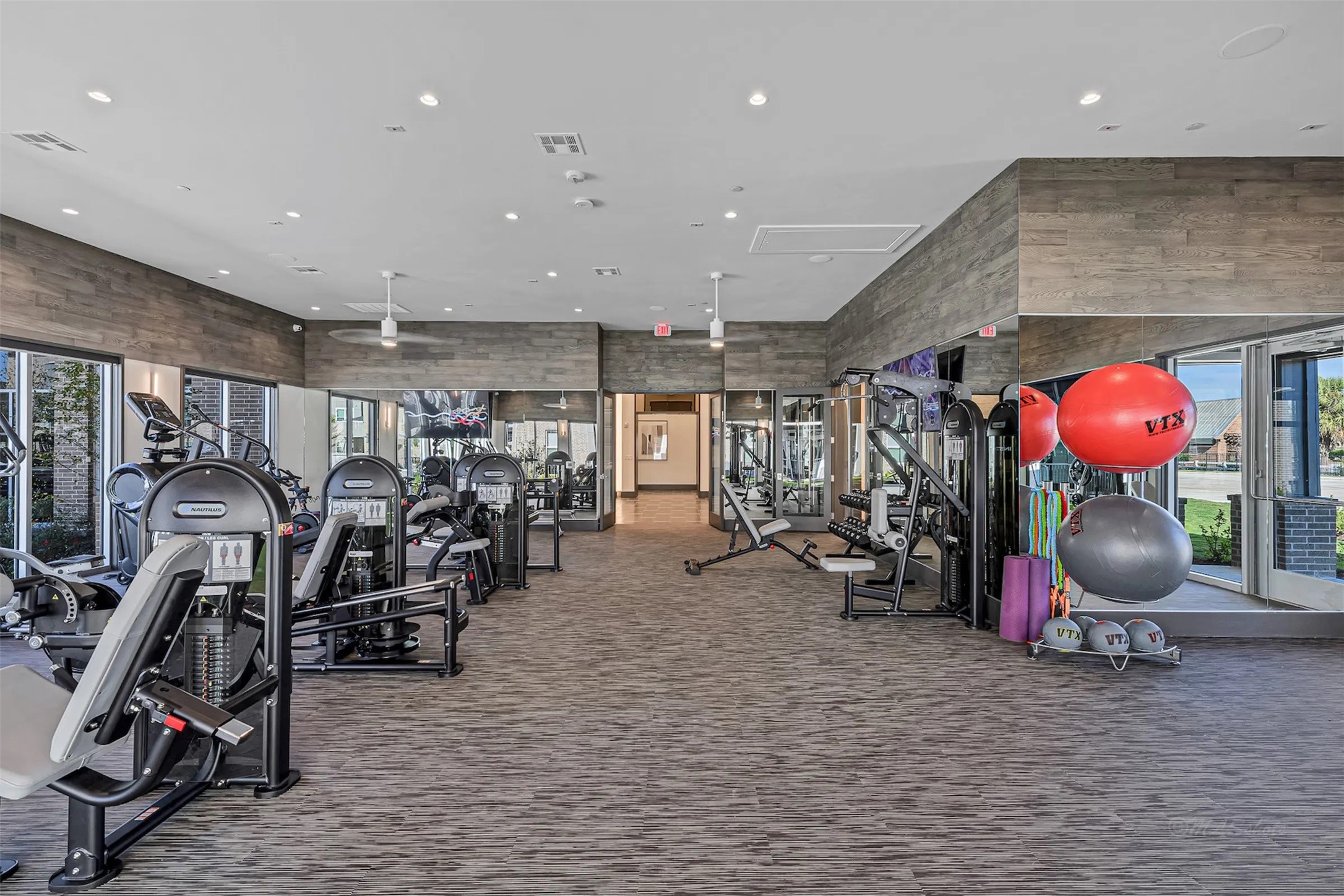 3830 Fm 2920 Rd Spring, Unit 4104 Spring, TX 77388 - Photo 29 of 32 a view of a room with gym equipment