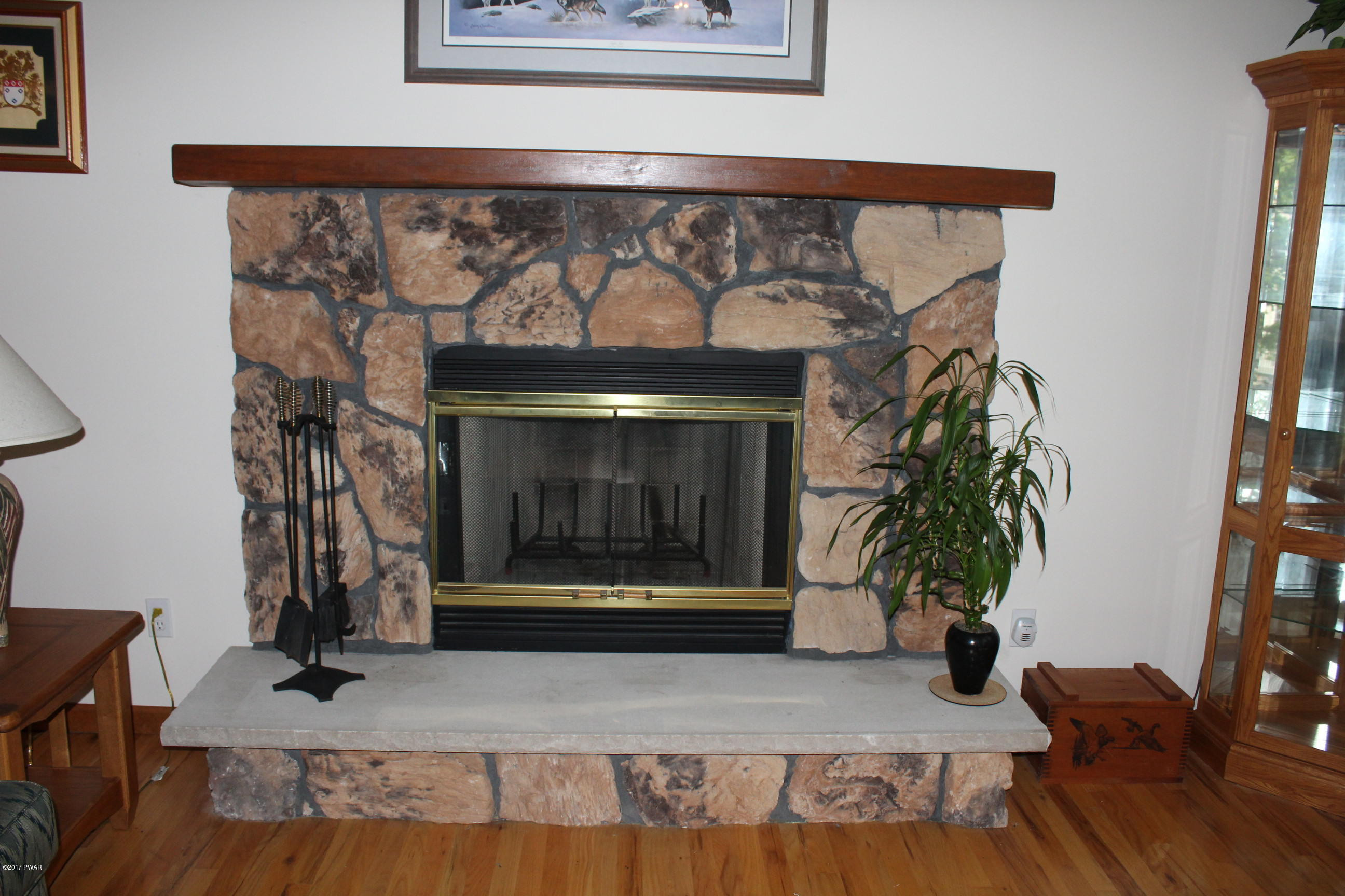 219 Maple Ridge Drive Hawley, PA 18428 - Photo 7 of 27 LIVING ROOM FIREPLACE
