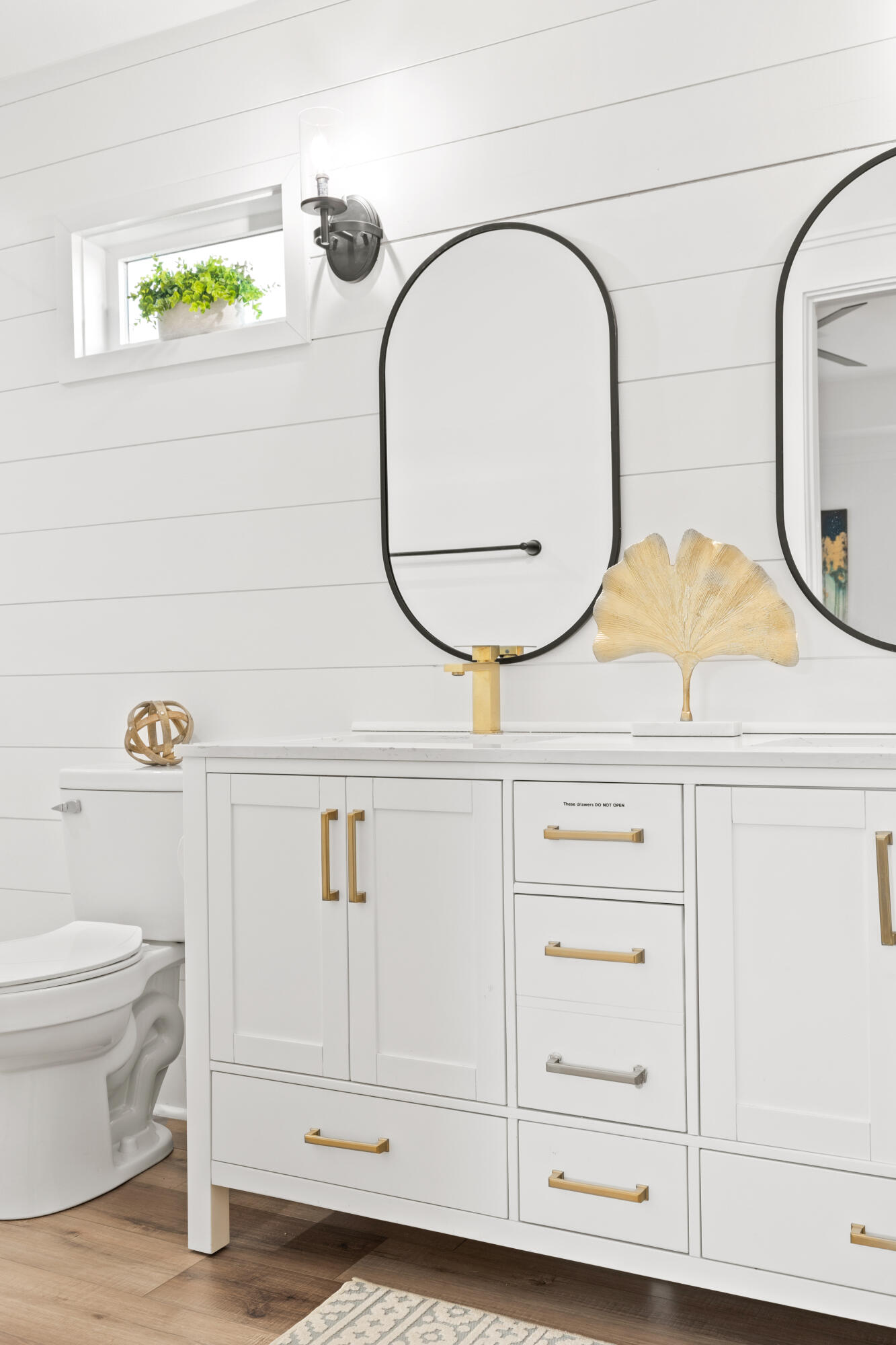 65 Brown Street Santa Rosa Beach, FL 32459 - Photo 24 of 43 a bathroom with a sink and a mirror