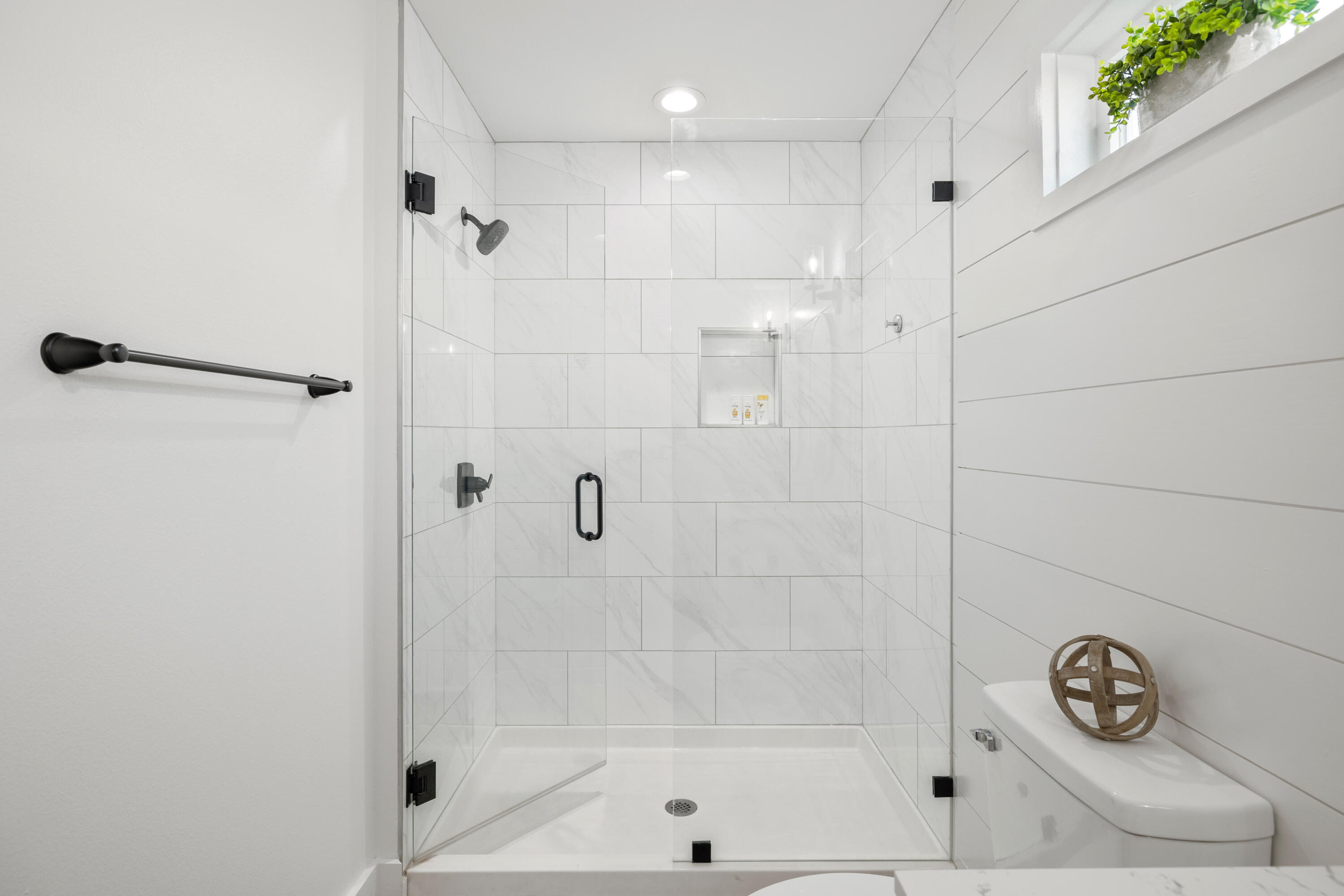 65 Brown Street Santa Rosa Beach, FL 32459 - Photo 25 of 43 a bathroom with a shower and a window