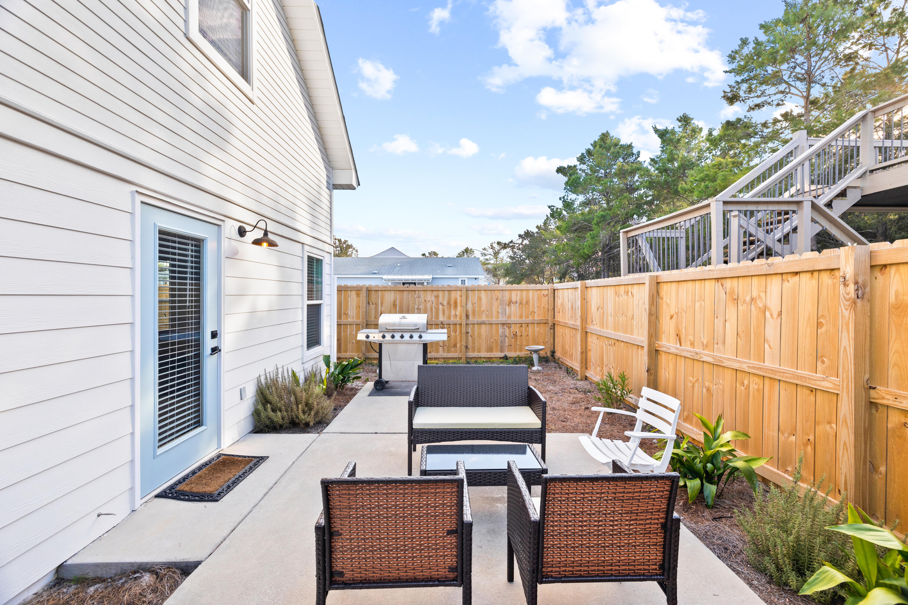 65 Brown Street Santa Rosa Beach, FL 32459 - Photo 32 of 43 a outdoor living space with patio furniture