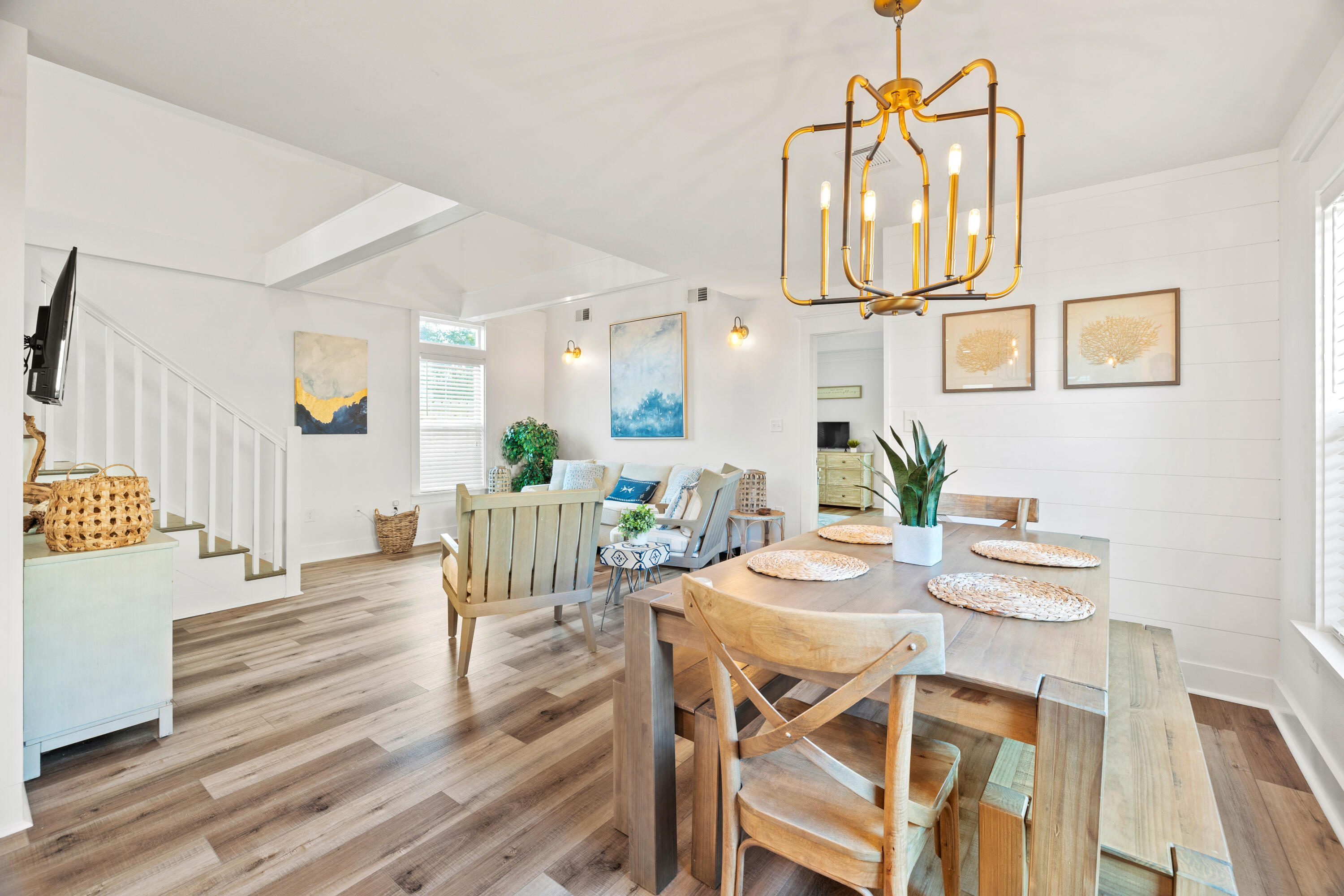 65 Brown Street Santa Rosa Beach, FL 32459 - Photo 7 of 43 a view of a dining room with furniture and wooden floor
