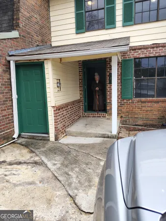 a front view of a house with a garage