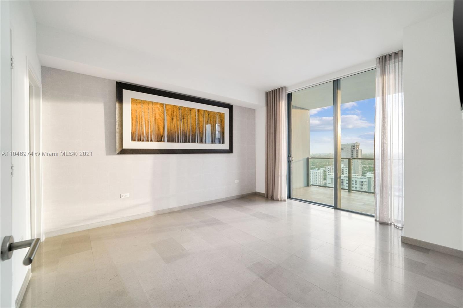 88 Southwest 7th Street, Unit 1904 Miami, FL 33130 - Photo 26 of 28 an empty room with windows