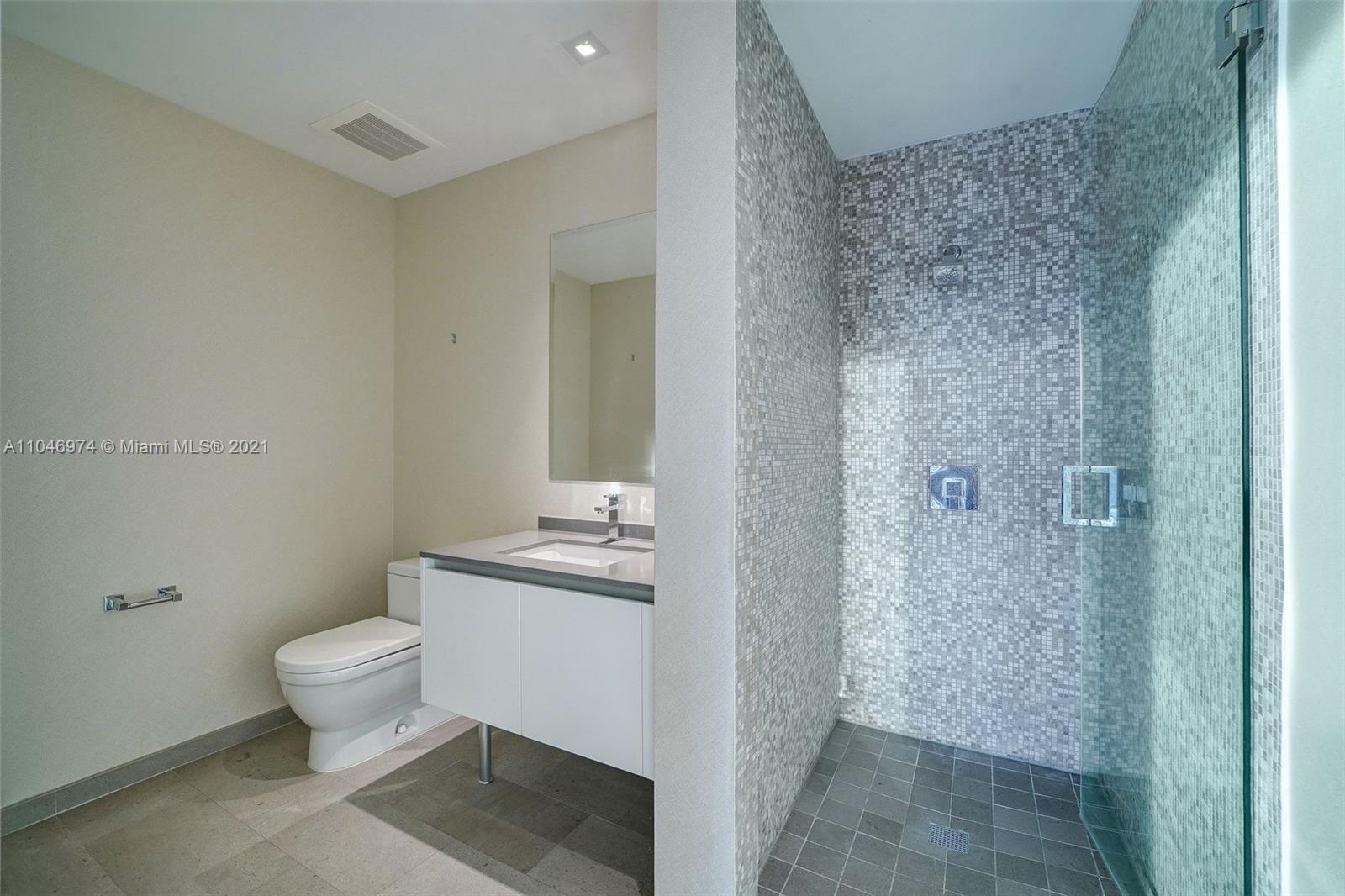 88 Southwest 7th Street, Unit 1904 Miami, FL 33130 - Photo 27 of 28 a bathroom with a toilet and a shower