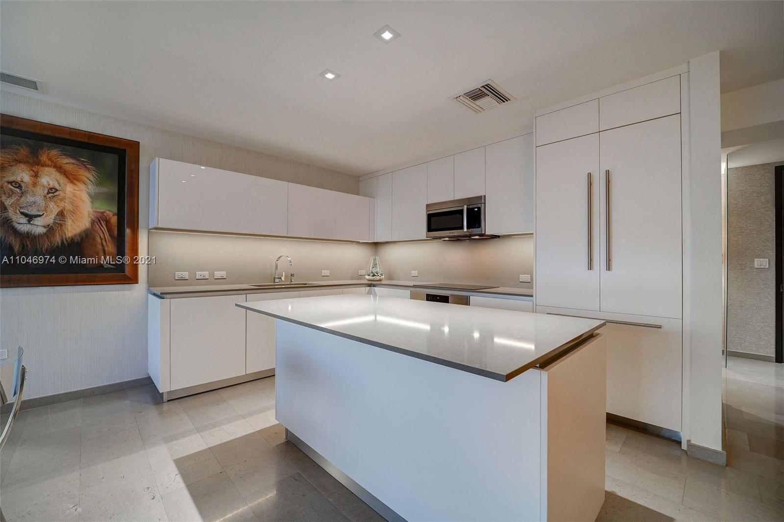 88 Southwest 7th Street, Unit 1904 Miami, FL 33130 - Photo 3 of 28 a kitchen with stainless steel appliances granite countertop a sink stove and refrigerator