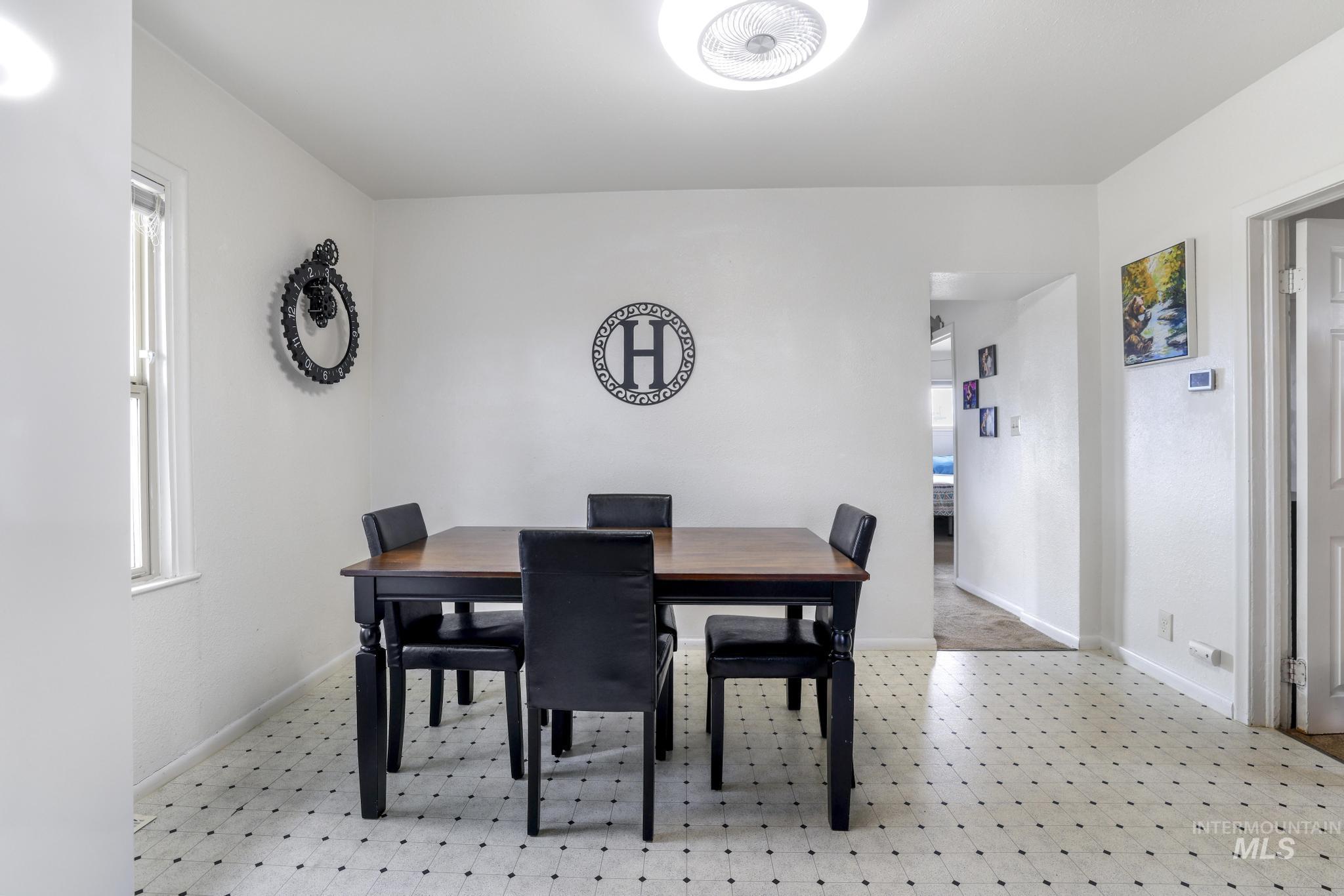 88 South 400 Road West Jerome, ID 83338 - Photo 19 of 31 Dining area featuring baseboards and light floors
