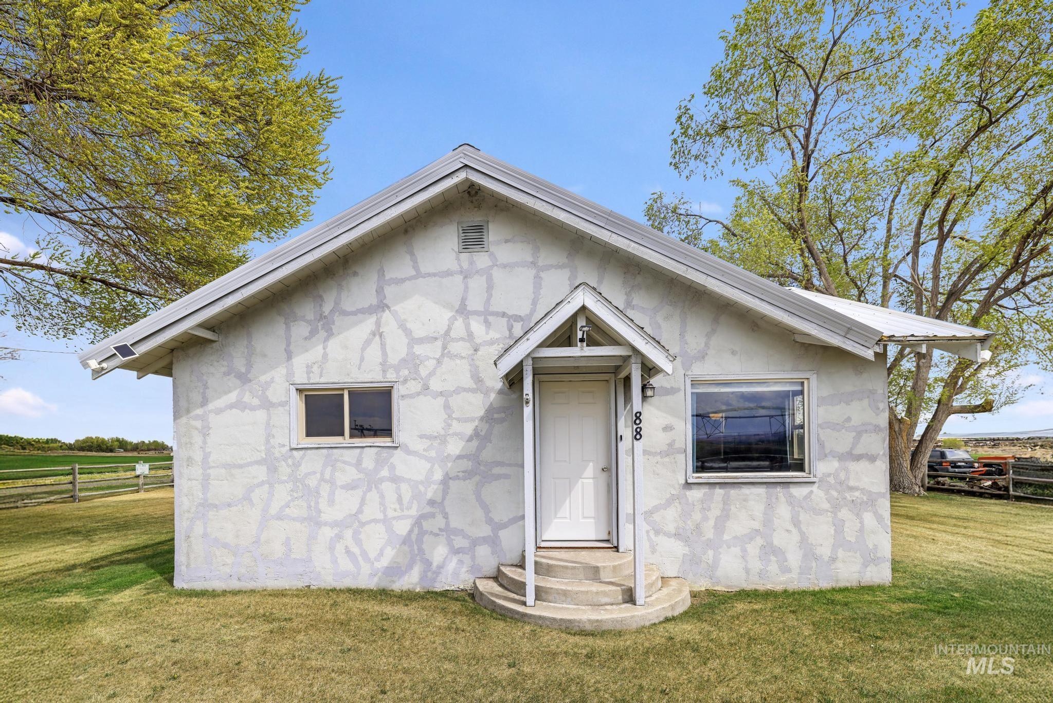 88 South 400 Road West Jerome, ID 83338 - Photo 2 of 31 View of front of property with entry steps and stucco siding