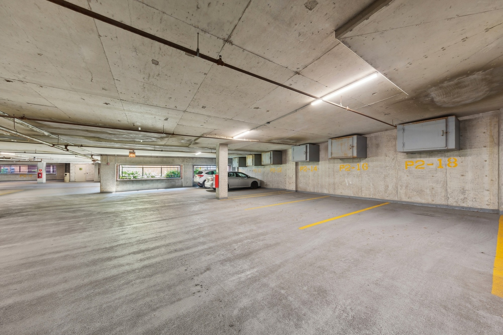 1500 West Monroe Street, Unit 306 Chicago, IL 60607 - Photo 13 of 13 a view of parking garage with car parked