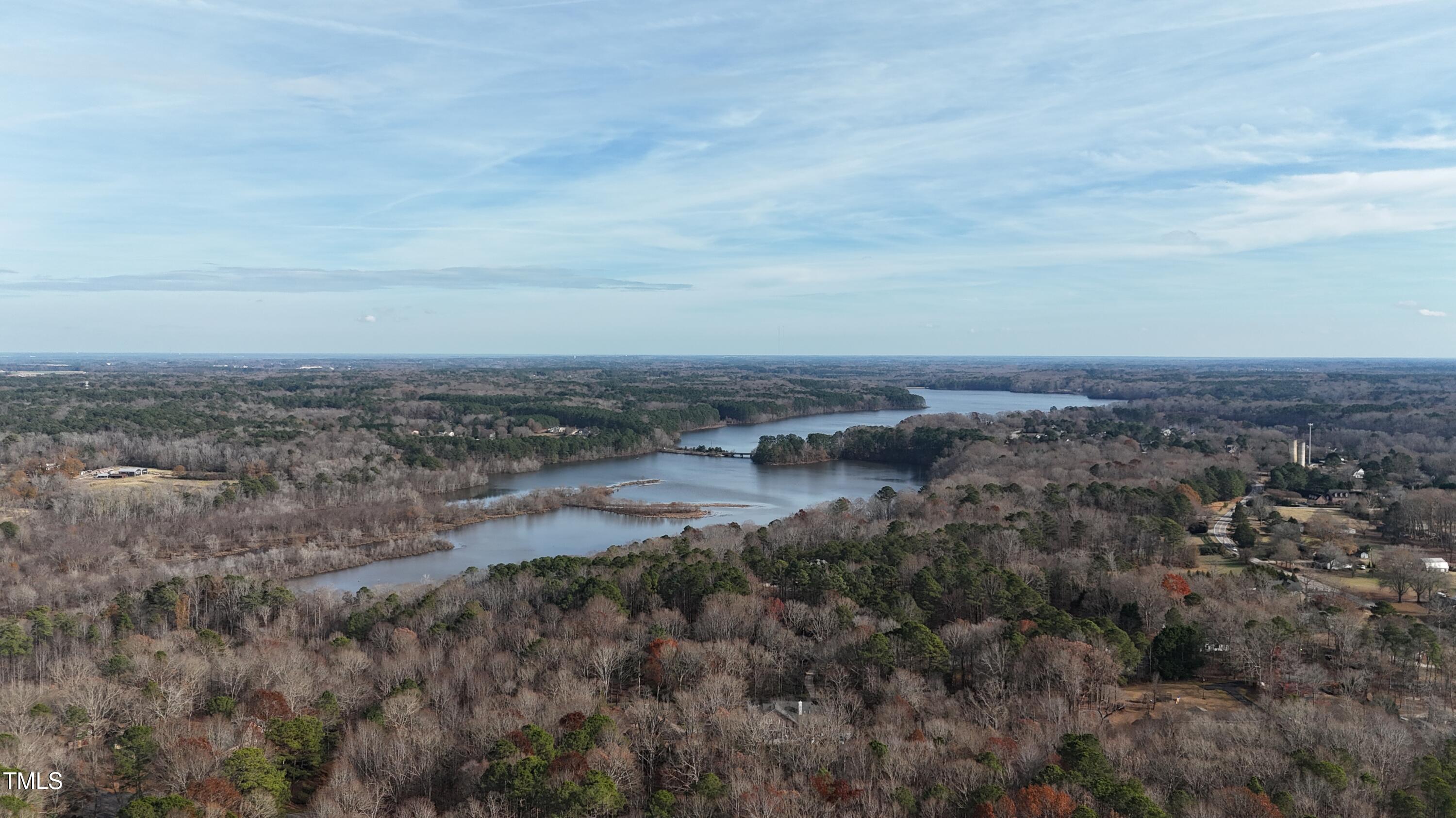 8014 Penny Road Raleigh, NC 27606 - Photo 6 of 8 an aerial view of residential house and trees