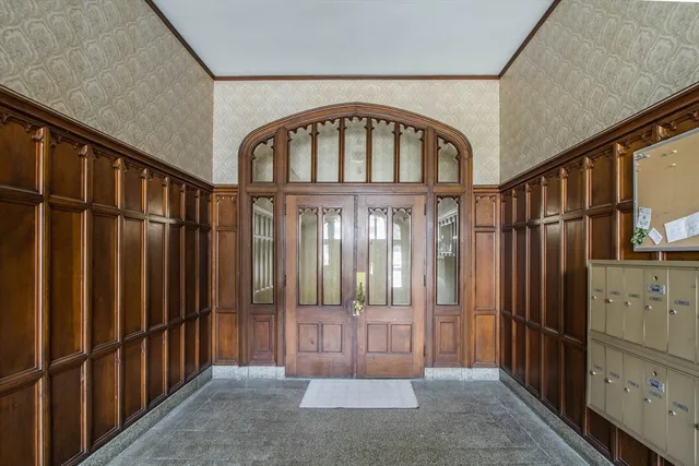 a view of an entryway with a front door