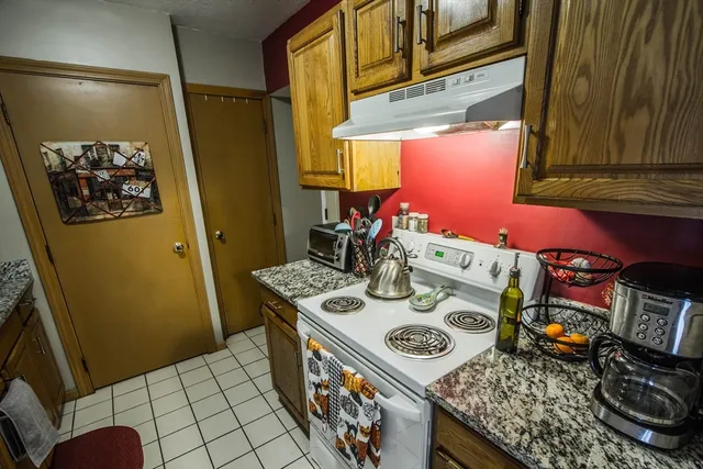 a view of a table and chairs in the kitchen