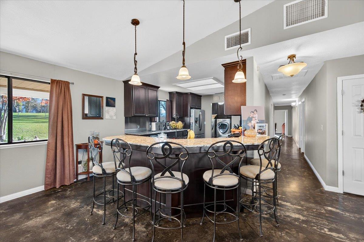 35102 Quail Oak Road Auberry, CA 93602 - Photo 19 of 61 a view of a dining room with furniture window and wooden floor