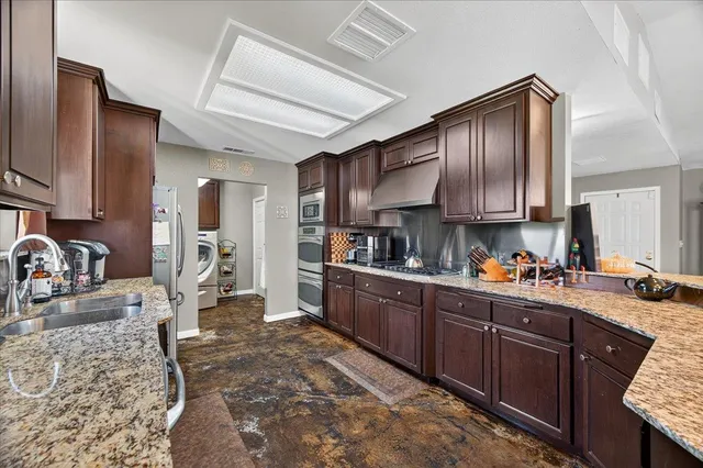 a room with furniture and a mirror