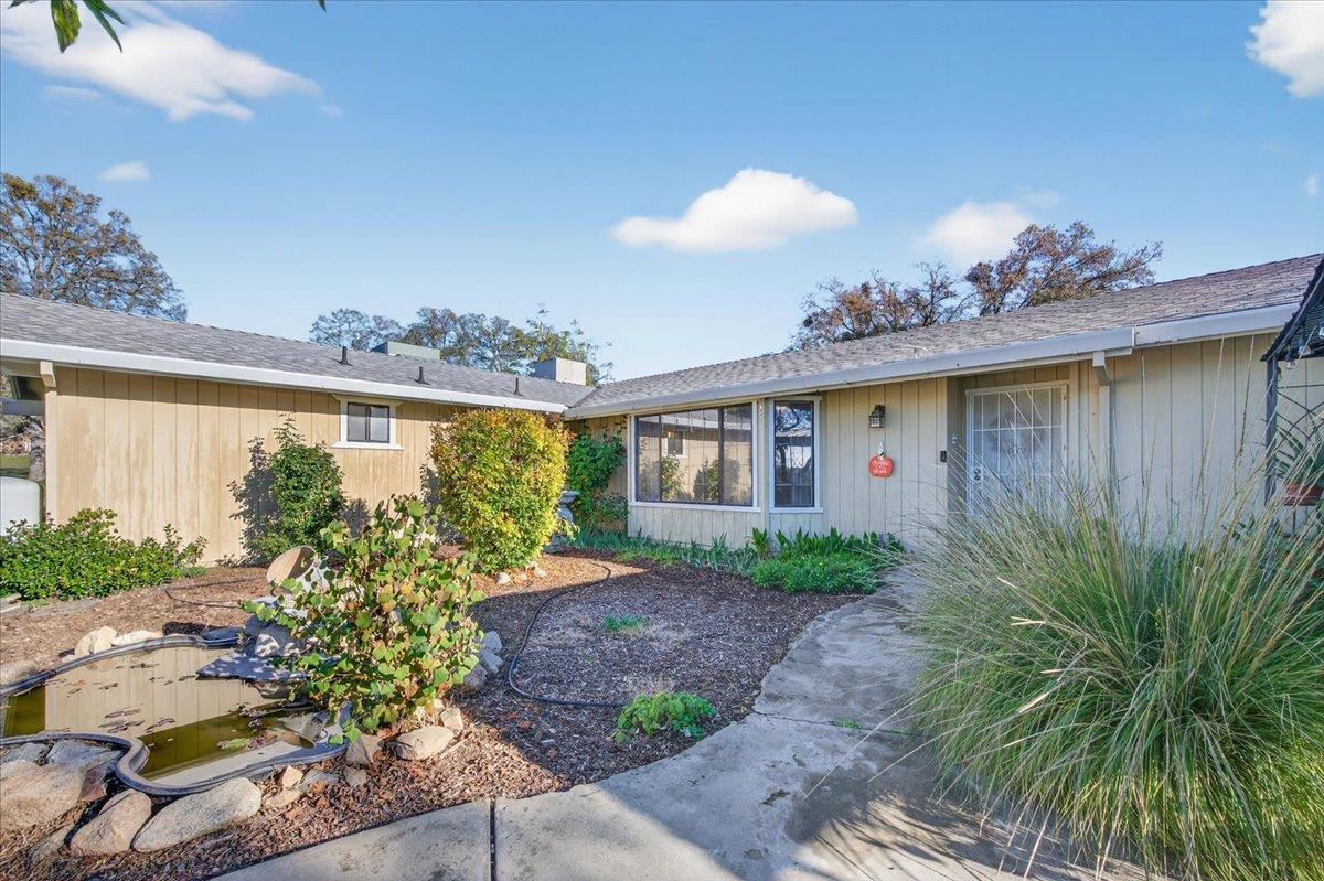 35102 Quail Oak Road Auberry, CA 93602 - Photo 2 of 61 a view of a house with a porch and furniture
