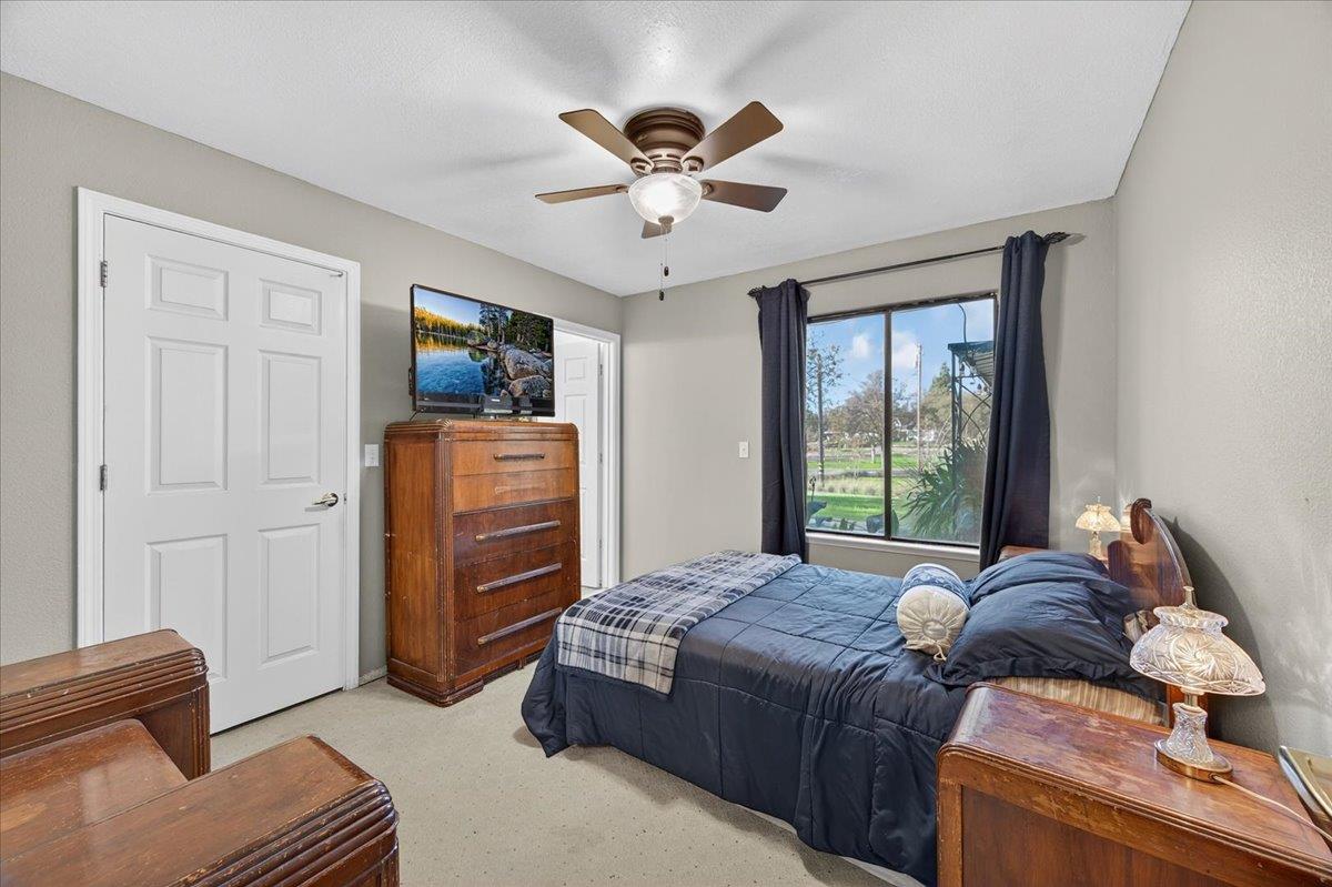 35102 Quail Oak Road Auberry, CA 93602 - Photo 25 of 61 a bed room with a bed and a window