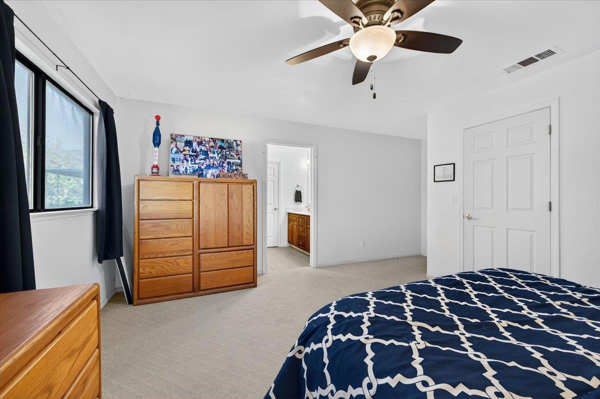 35102 Quail Oak Road Auberry, CA 93602 - Photo 31 of 61 a bedroom with a bed and a dresser